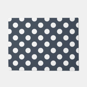White polka dots on blue-grey doormat