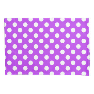 White polka dots on bright purple pillowcase