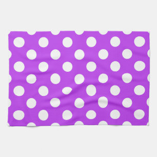 White polka dots on bright purple tea towel