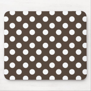White polka dots on brown mouse mat