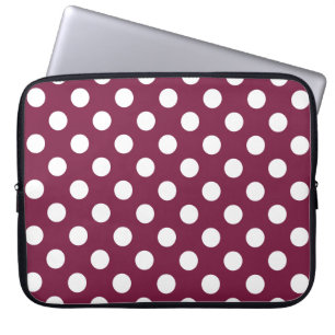 White polka dots on burgundy laptop sleeve