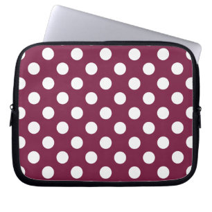 White polka dots on burgundy laptop sleeve