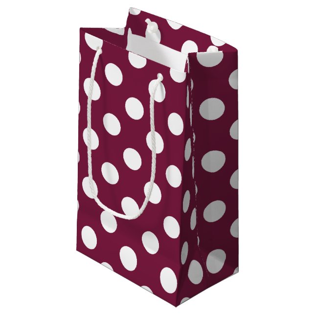 White polka dots on burgundy small gift bag (Front Angled)