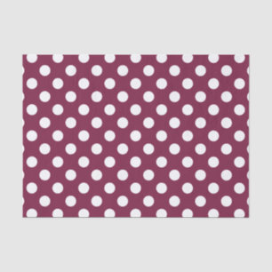 White polka dots on burgundy tissue paper