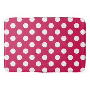 White polka dots on cerise bath mat