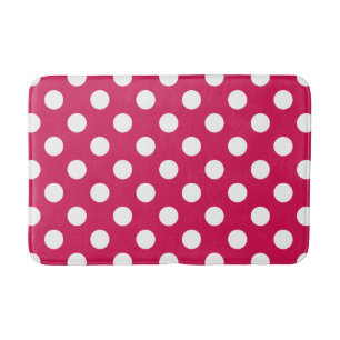 White polka dots on cerise bath mat