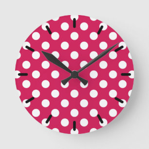 White polka dots on cerise round clock