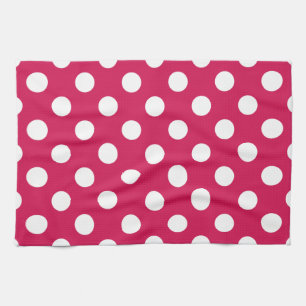 White polka dots on cerise tea towel