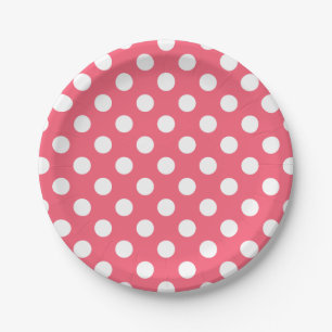 White polka dots on coral paper plate