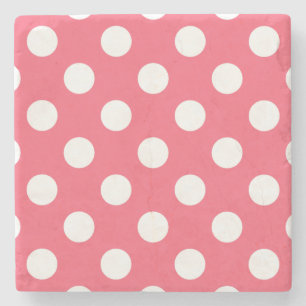 White polka dots on coral stone coaster