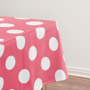 White polka dots on coral tablecloth