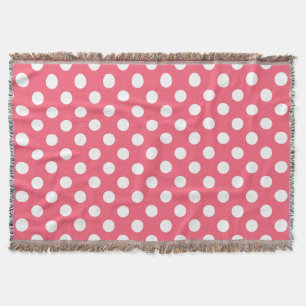 White polka dots on coral throw blanket
