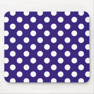 White polka dots on dark blue mouse mat