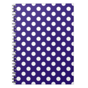 White polka dots on dark blue notebook