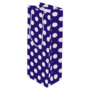 White polka dots on dark blue wine gift bag