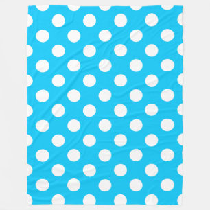 White polka dots on electric blue fleece blanket