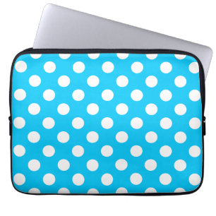 White polka dots on electric blue laptop sleeve