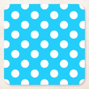 White polka dots on electric blue square paper coaster