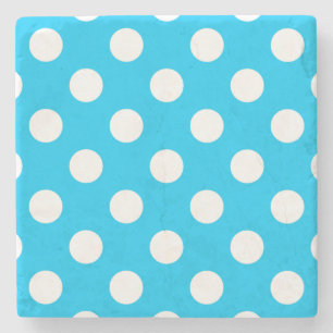 White polka dots on electric blue stone coaster