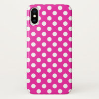 White polka dots on fuchsia
