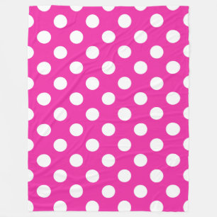 White polka dots on fuchsia fleece blanket