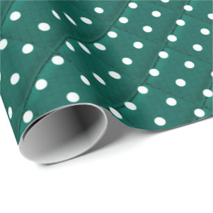 white polka dots on green wrapping paper