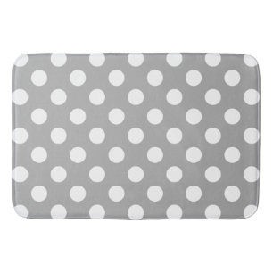 White polka dots on grey bath mat