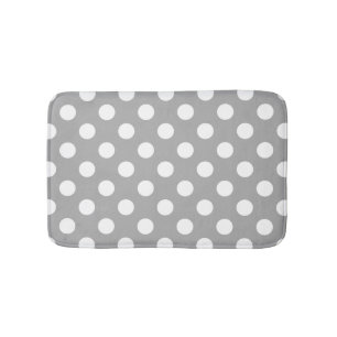 White polka dots on grey bath mat