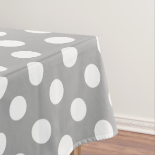 White polka dots on grey tablecloth