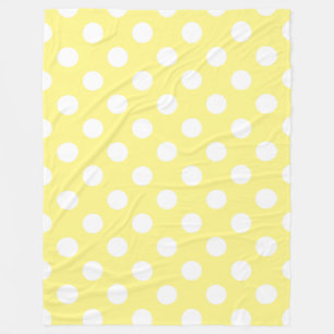 White polka dots on lemon yellow fleece blanket