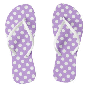 White polka dots on lilac flip flops