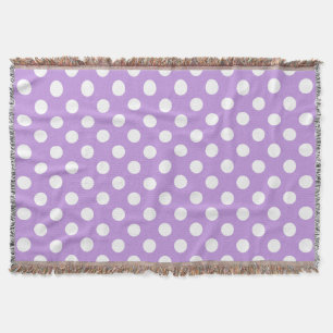 White polka dots on lilac throw blanket