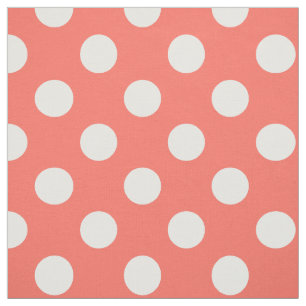 White polka dots on living coral fabric