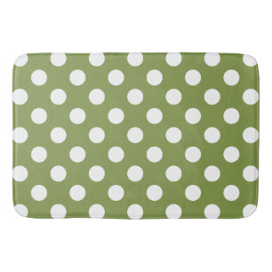White polka dots on olive green bath mat