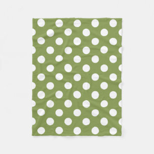 White polka dots on olive green fleece blanket