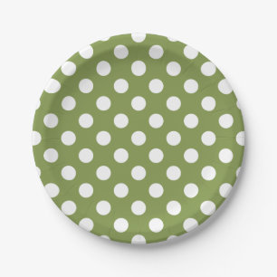 White polka dots on olive green paper plate