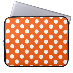White polka dots on orange laptop sleeve