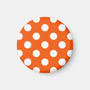 White polka dots on orange magnet