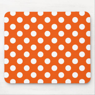 White polka dots on orange mouse mat