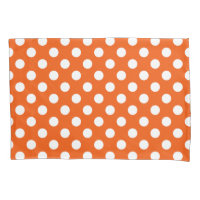 White polka dots on orange