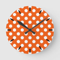 White polka dots on orange