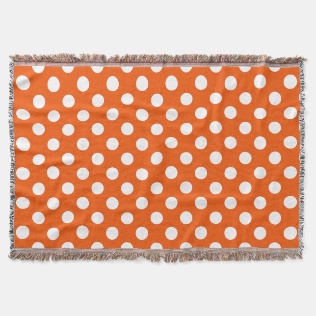 White polka dots on orange throw blanket (Front)