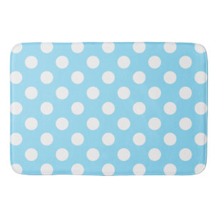 White polka dots on pale blue bath mat