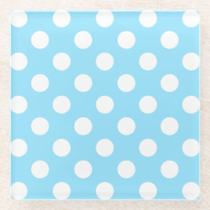 White polka dots on pale blue glass coaster