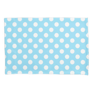 White polka dots on pale blue pillowcase
