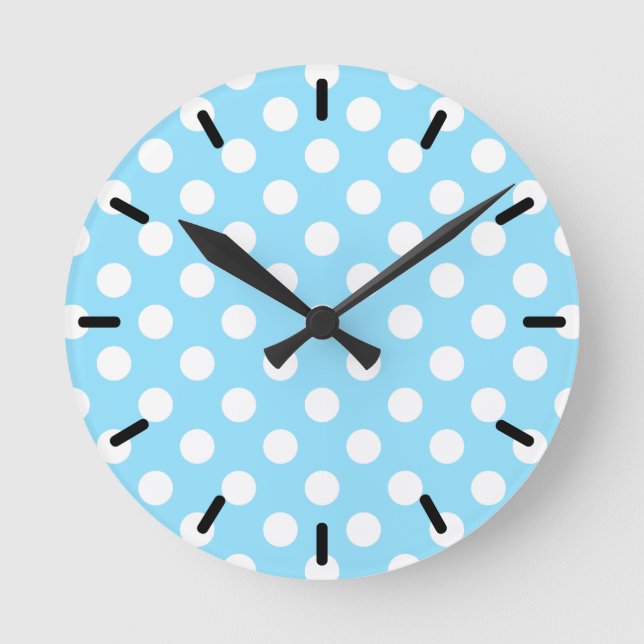 White polka dots on pale blue round clock (Front)