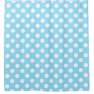White polka dots on pale blue shower curtain