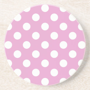 White polka dots on pale pink coaster