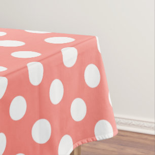 White polka dots on peach tablecloth