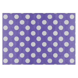 White polka dots on periwinkle cutting board